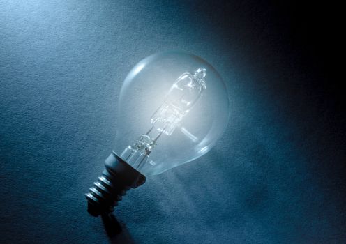 Single illuminated electric light bulb