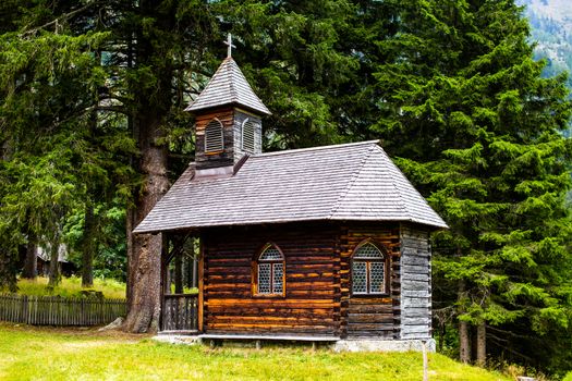 Small wooden church in high mountains Austria