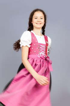 An image of a sweet traditional bavarian girl