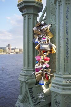 LONDON, UK – APRIL 14, 2014: Lover's locks on London Bridge.