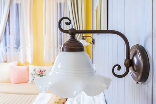 vintage wall lamp in the bed room