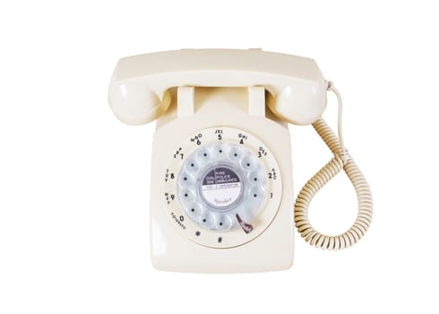 Retro rotary vintage telephone on white background