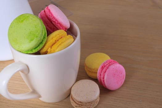 traditional french colorful sweet Macaron in cup