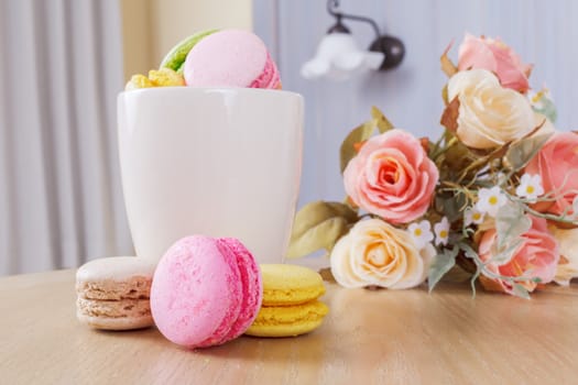 traditional french colorful sweet Macaron in cup