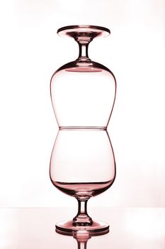 stack of empty wine glass on glass table 