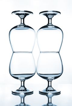 stack of empty wine glass on glass table 