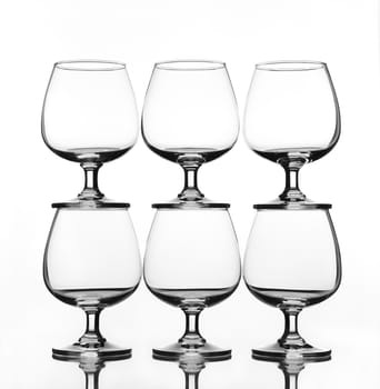stack of empty wine glass with shadow (gray scale)