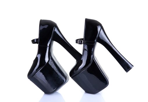 Black fetish high heel shoes, isolated on white background 