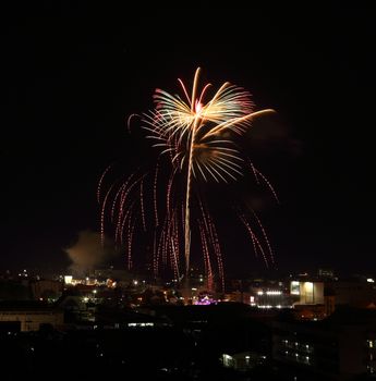 beautiful fireworks over sky at the night