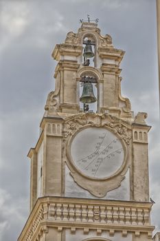 sundial on the clock tower of the Cathedral Basilica of St. Agatha in Gallipoli (Le)