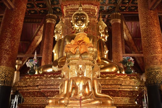 There are four small statues of Buddha in the temple Phumin Nan, Thailand