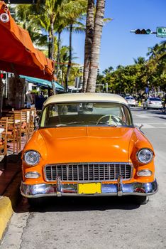 MIAMI BEACH - MARCH 20. Vintage Car Parked along Ocean Drive in the Famous Art Deco District in South Beach. South Beach, FL, JANUARY 22, 2014. 