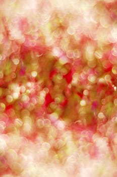 red and gold background, blurred reflections and bokeh