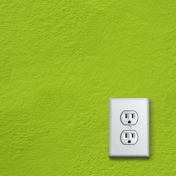 simple white electric usa socket on green wall
