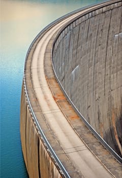 blue water tank with a concrete dam