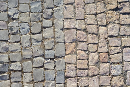 Cobblestone texture, stone block floor of pavement