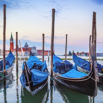 Gondolas in the Grand Canal at sunset, special photographic processing.