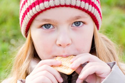 Autumn photo of beautiful girl in red hat