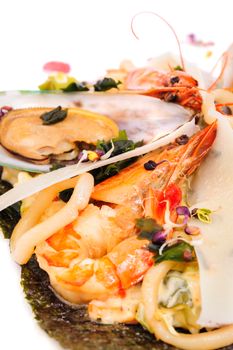 prepared shrimp and oyster arranged on plate