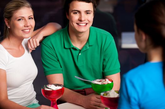 Three friends enjoying day out in a restaurant