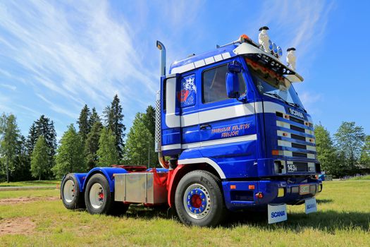 LOIMAA, FINLAND - JUNE 15, 2014:  Blue Scania 143H 450 truck tractor displayed at HeMa Show 2014 in Loimaa, Finland.