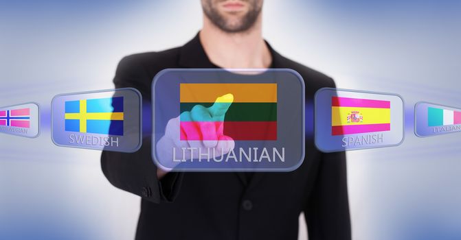 Hand pushing on a touch screen interface, choosing language or country, Lithuania