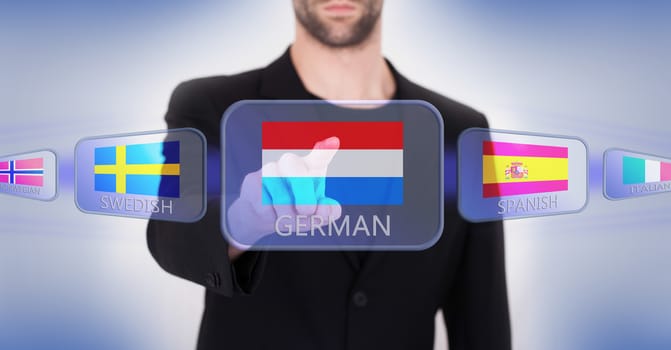 Hand pushing on a touch screen interface, choosing language or country, Luxembourg