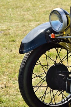 Vintage car wheel and head lamp