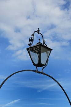 Black cast iron lamp with sky 