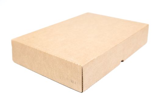 Brown paper box on white background. Rectangular paper box on a white background. Can be deployed easily.