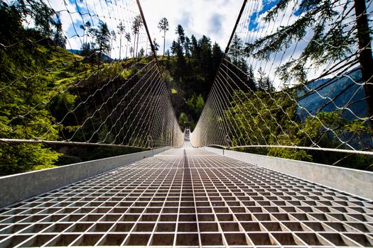 Bridge in high Alps mountains in Austria