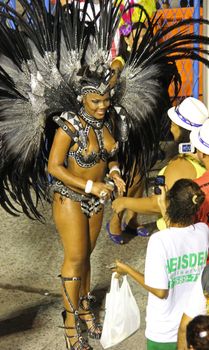 An entertainer with spectators at a carnaval in Rio de Janeiro, Brazil
03 Mar 2014
No model release
Editorial only