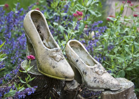 decoration of woman high heel shoes in garden