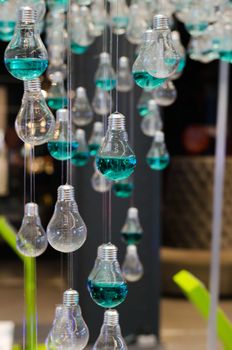 Emerald Liquid in Light bulbs Decorated in Modern Interior