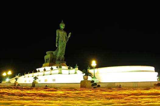 Walk with lighted candles in hand around at Phutamonthon Park ,Nakhon Pathom Province,Thailand