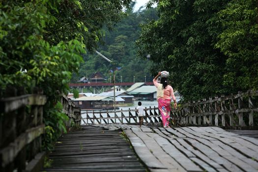 old an long wooden bridge at Sangklaburi,Kanchan aburi province, Thailand