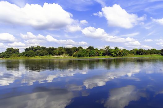 Reflections of Clouds in Lake. Asia, Thailand.