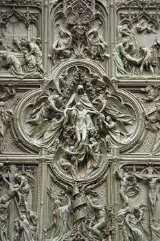 Doors of the Duomo cathedral in Milan, Italy.