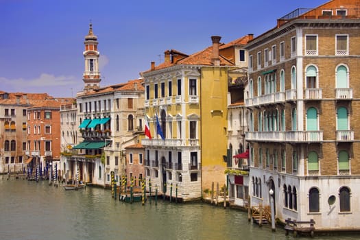 Old, colorful buildings along the canal in Venice, Italy