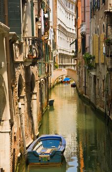 Canal view with boat in Venice, Italy