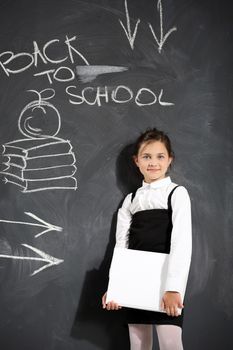 A child at the blackboard
