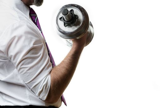 Businessman holding a silver dumbbell in the right hand