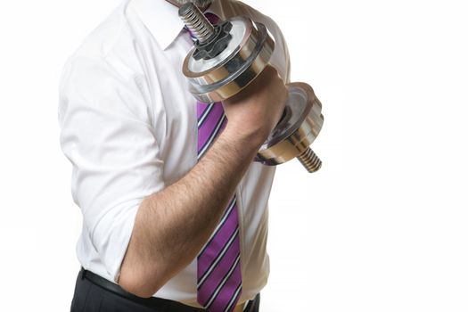 Businessman holding a silver dumbbell in the right hand