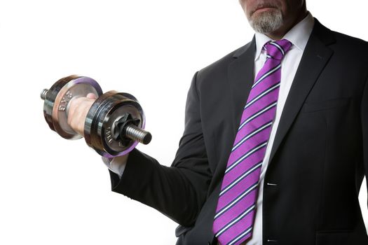 Businessman in black suit holding a silver dumbbell in the right hand