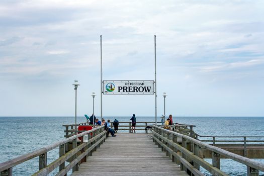 Prerow, Germany - June 15, 2012: Pier sign showing "Ostseebad Prerow". The sea spa town is a famous tourist destination in germany.