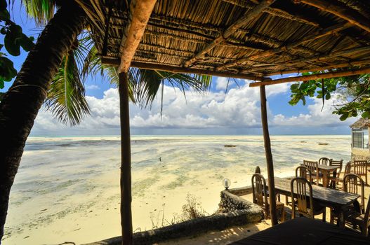 Zanzibar beach and coral rocks bule green ozean Tanzania