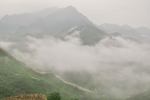 Great Wall fog over mountains in Beijing, China.