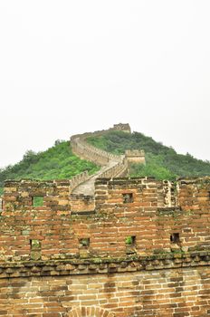 Great Wall fog over mountains in Beijing, China.