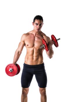 Muscular sexy shirtless young man exercising biceps with dumbbells, isolated on white 