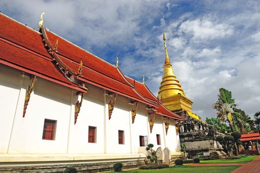 Golden Pagoda and blue sky, Wat Phra Thad Chang Kham, Nan Thailand